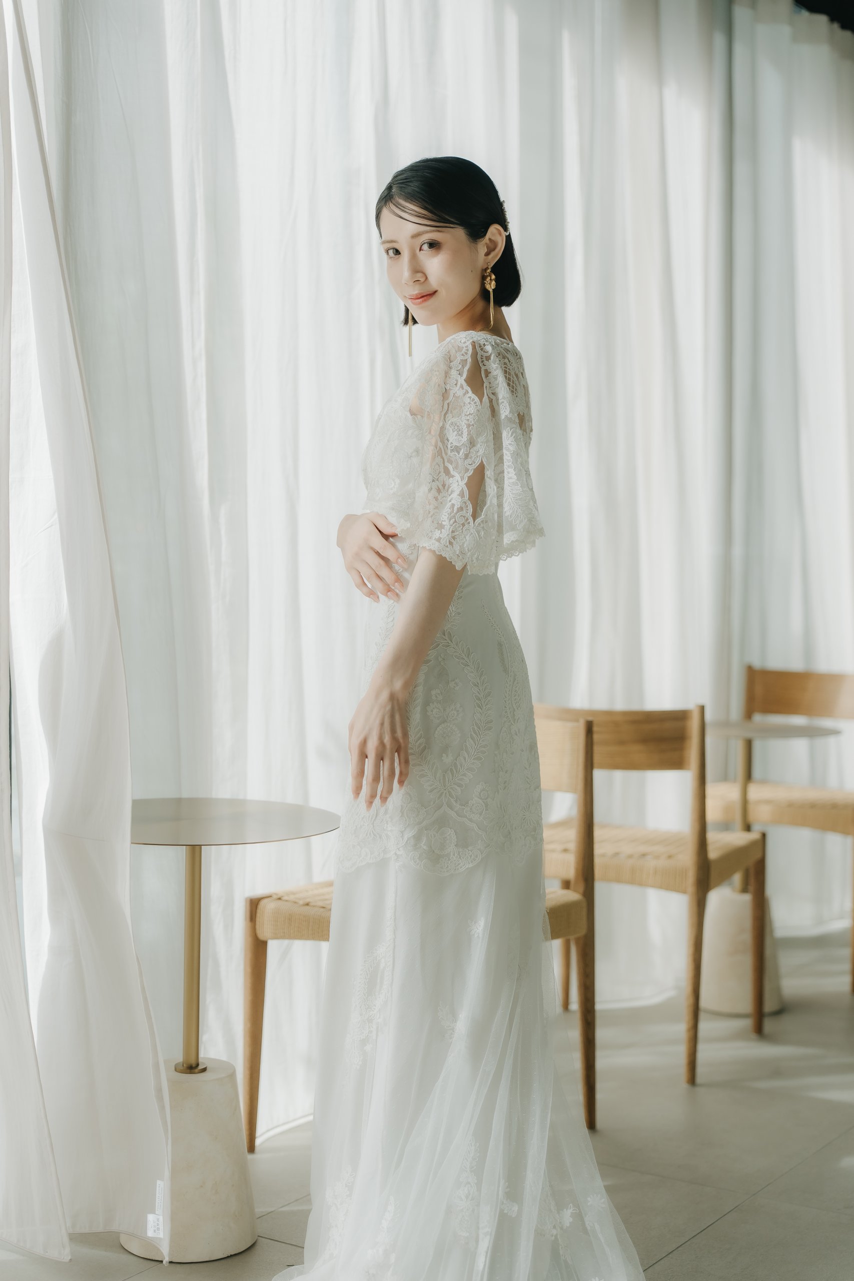 クレアペティボーンのレンタルウェディングドレスを着た新婦